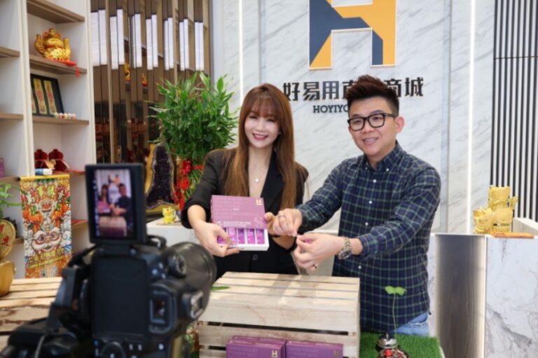 Sunday and Mario doing live selling in their studio.